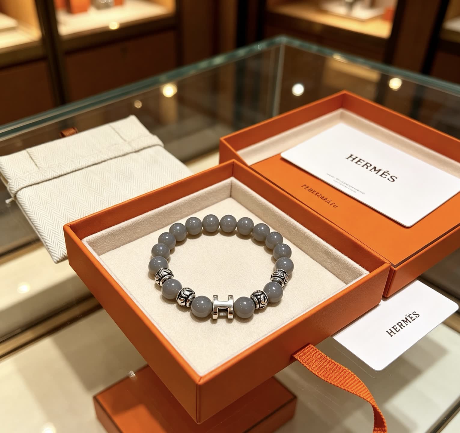 Hermes Hermès Paris Grey Beaded Bracelet with Silver H-Bead