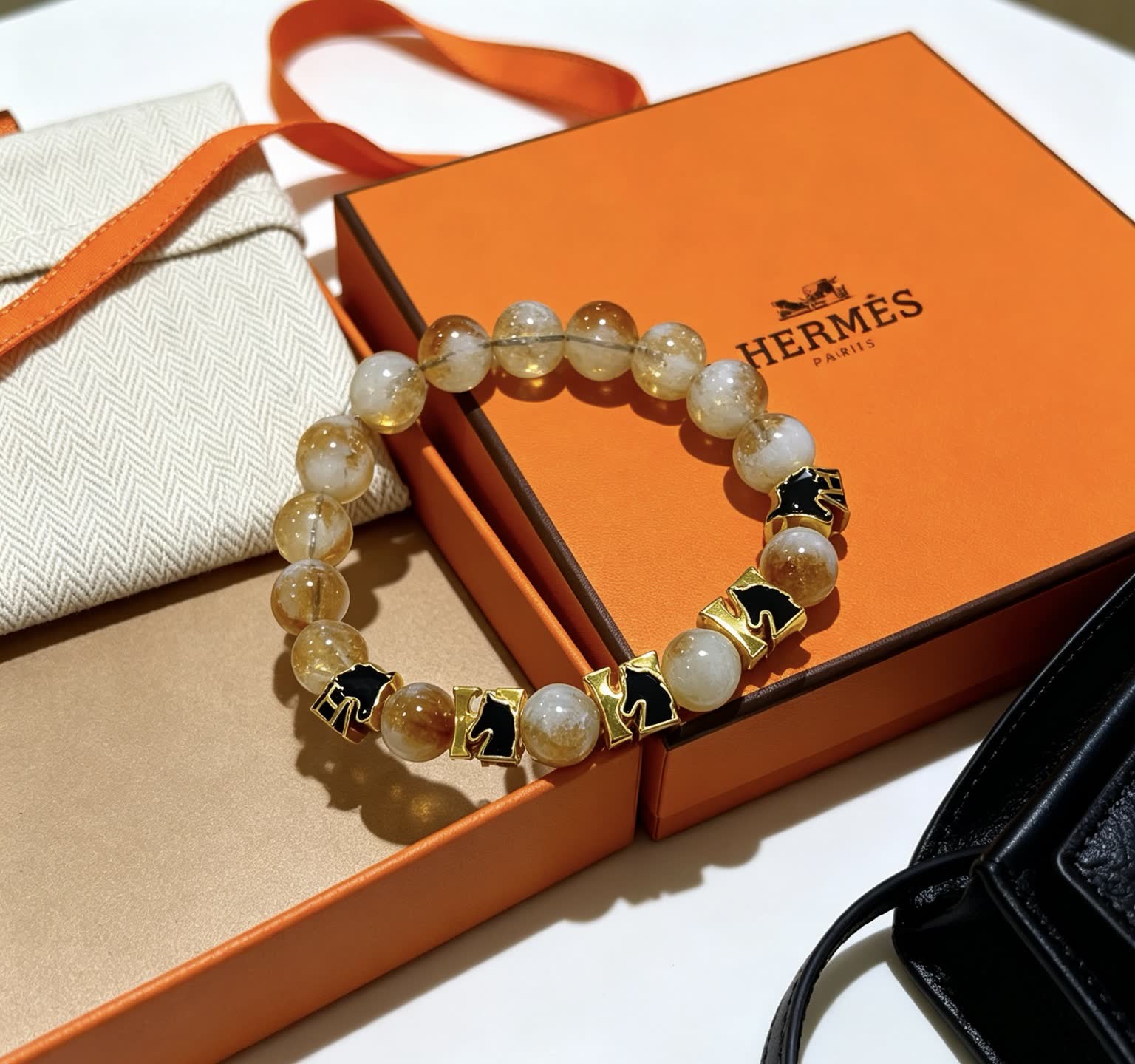 Hermes Hermès Bracelet with Gold and Black Accents