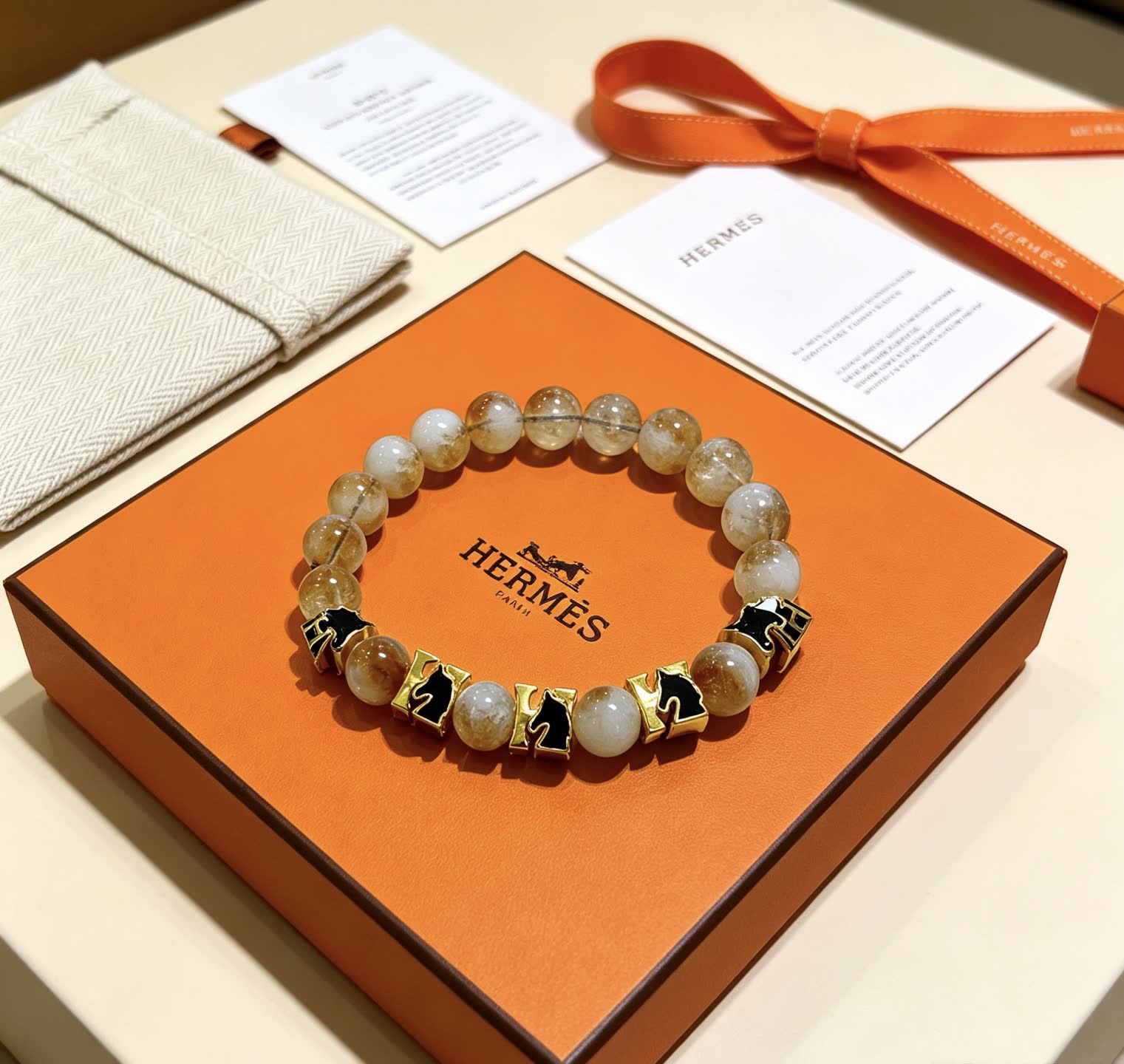 Hermes Hermès Bracelet with Gold and Black Accents
