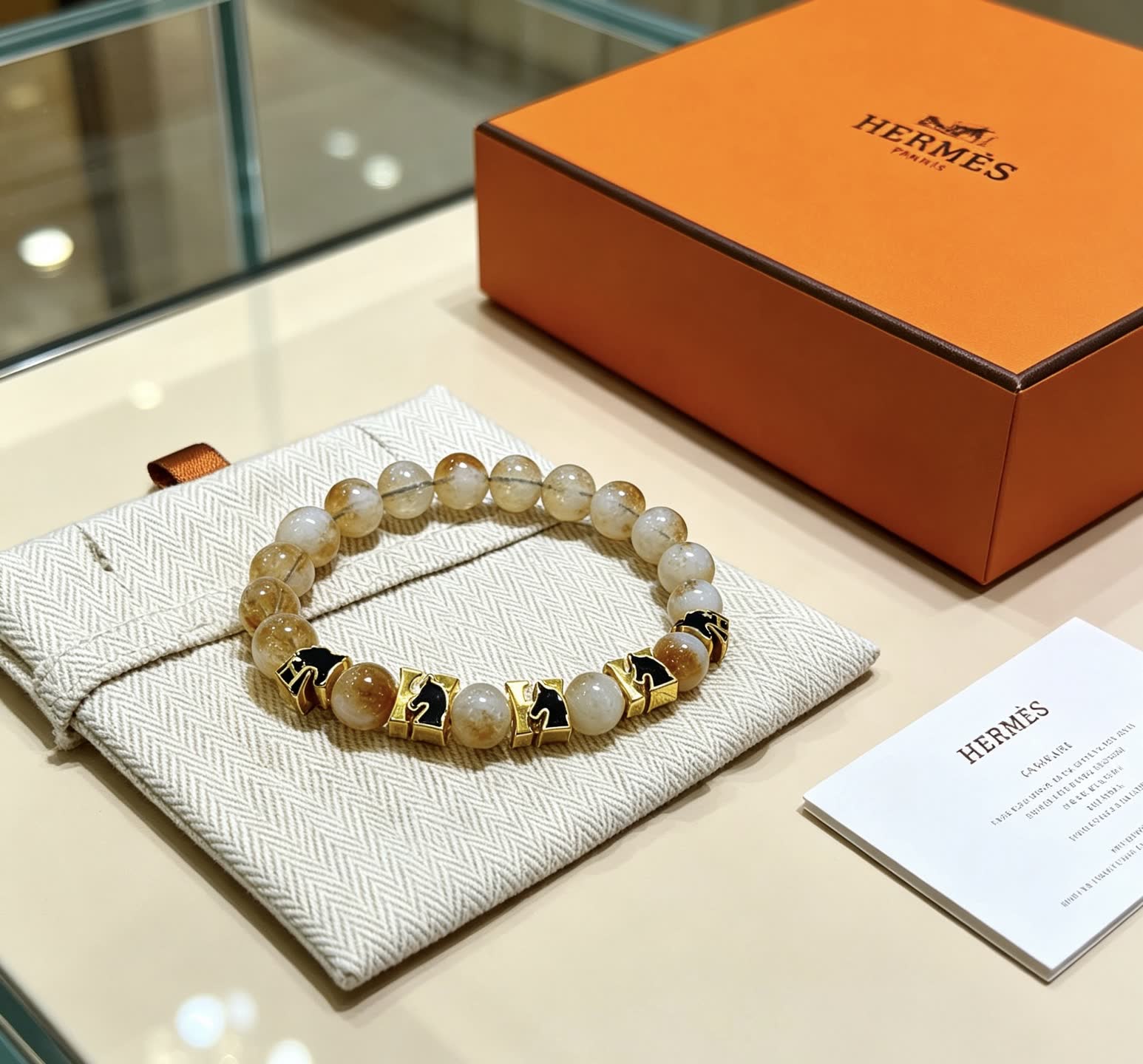 Hermes Hermès Bracelet with Gold and Black Accents