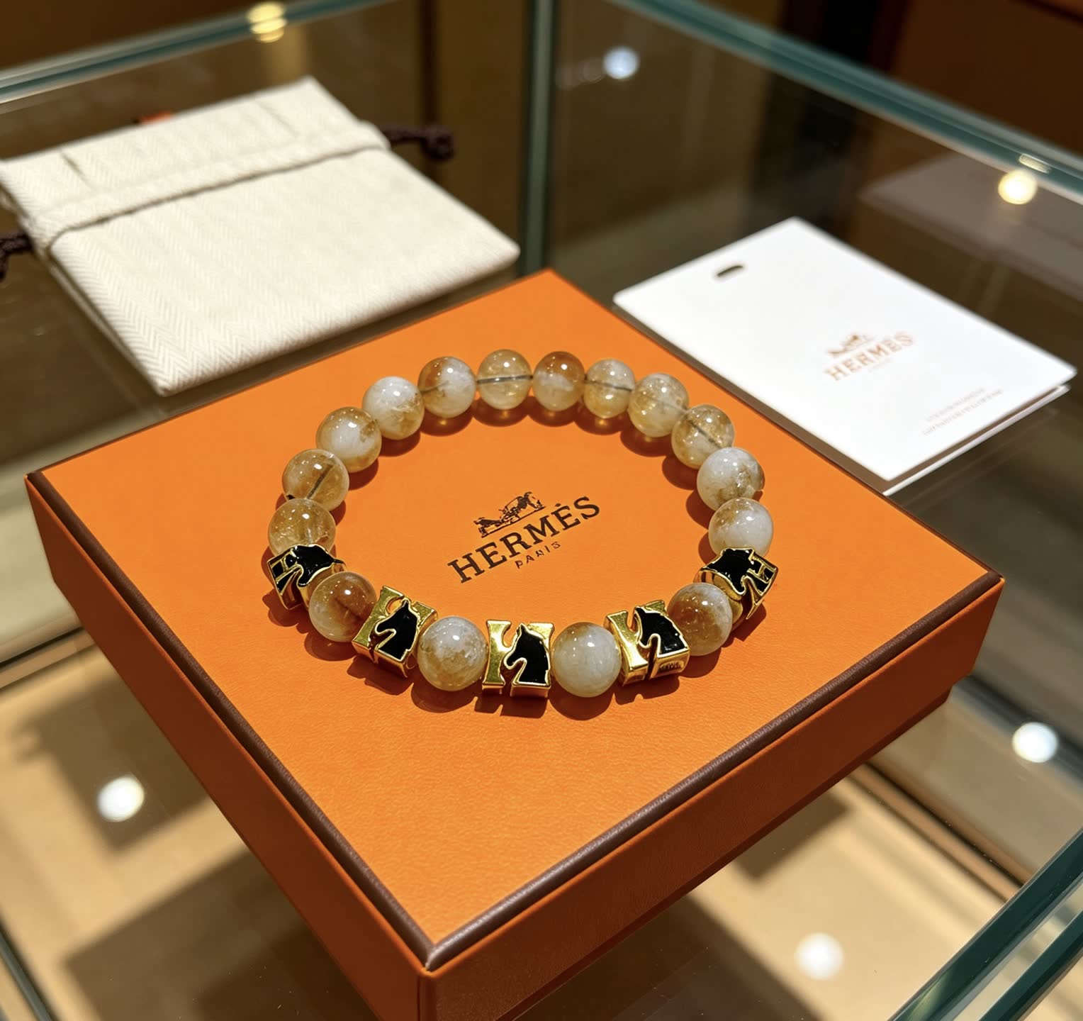 Hermes Hermès Bracelet with Gold and Black Accents