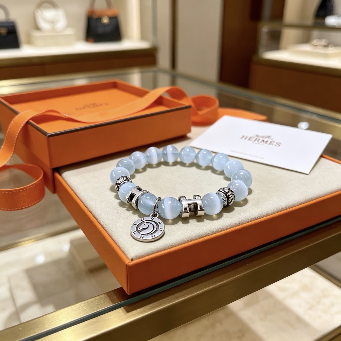 Hermes Hermès Blue Opal Beaded Bracelet with H Logo and Medallion