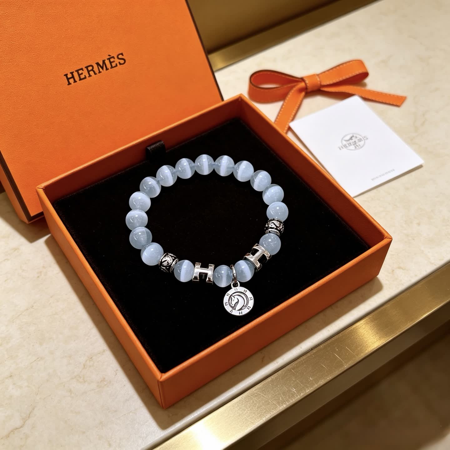 Hermes Hermès Blue Opal Beaded Bracelet with H Logo and Medallion