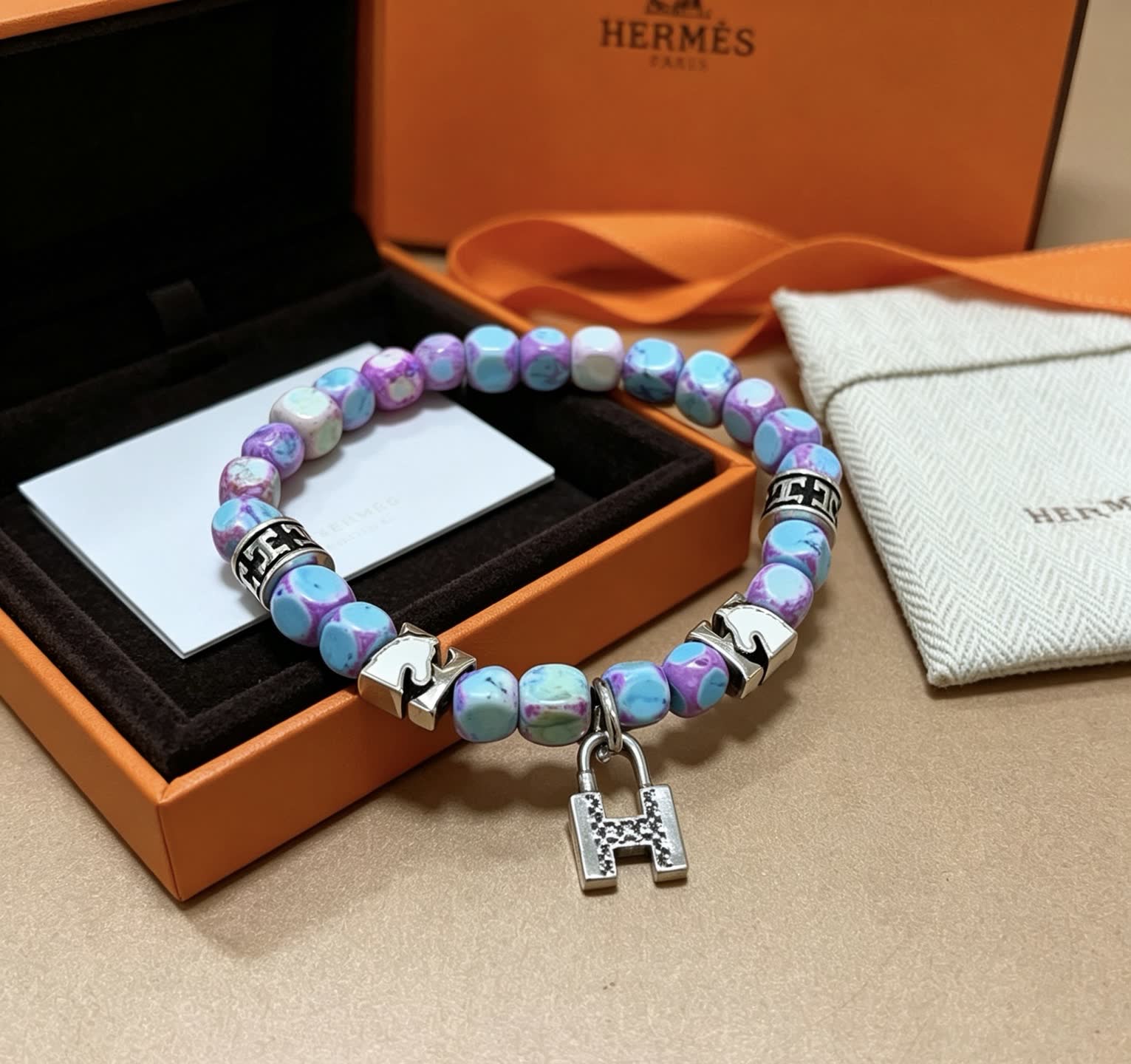 Hermes Hermès Multicolored Beaded Bracelet with Silver Accents