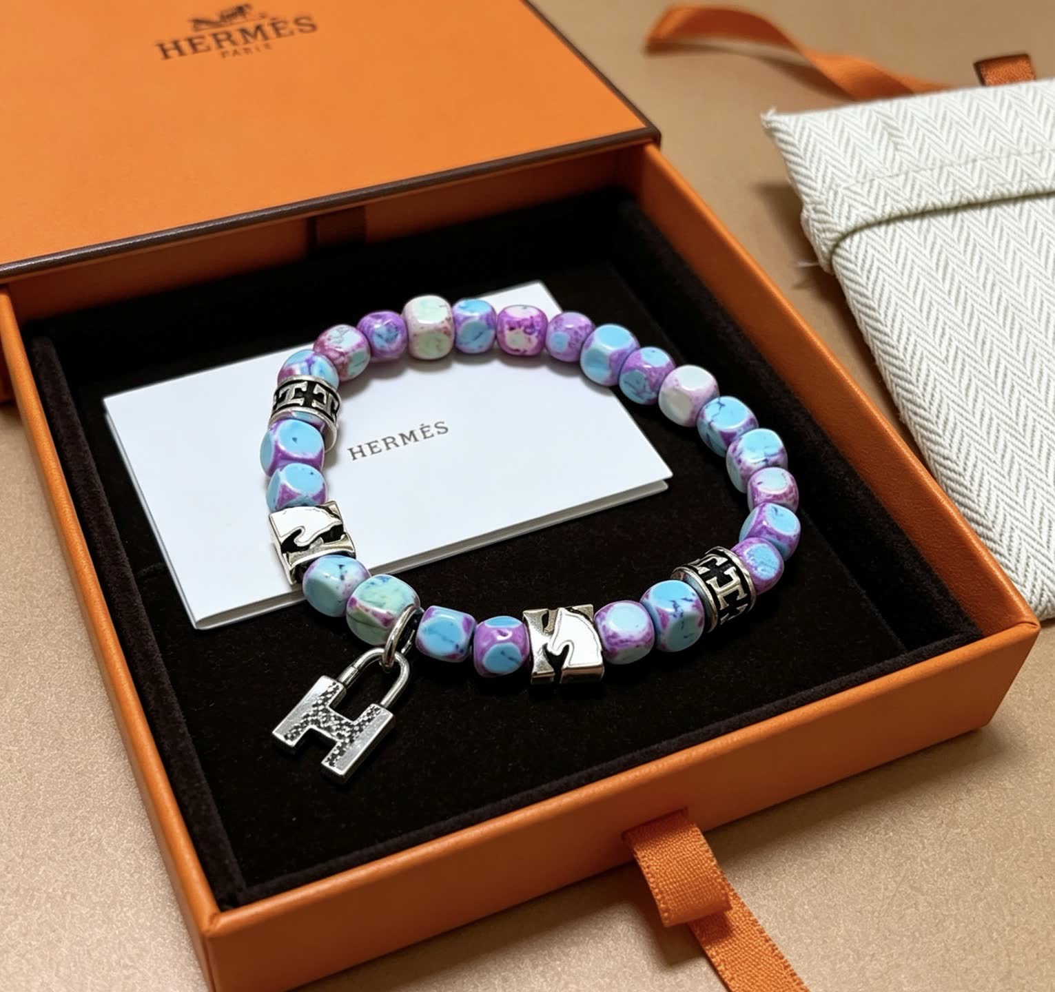 Hermes Hermès Multicolored Beaded Bracelet with Silver Accents