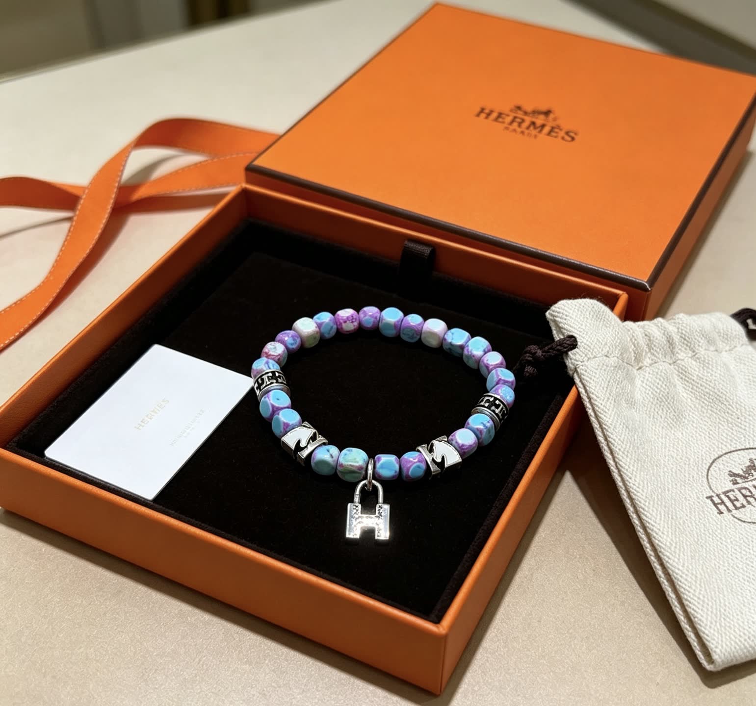 Hermes Hermès Multicolored Beaded Bracelet with Silver Accents