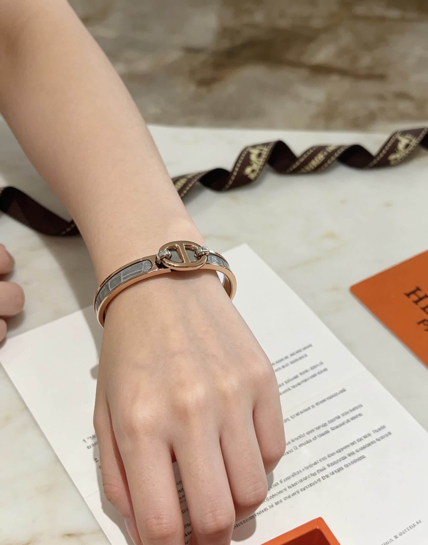 Hermes Hermès Gold and White Leather Bracelet