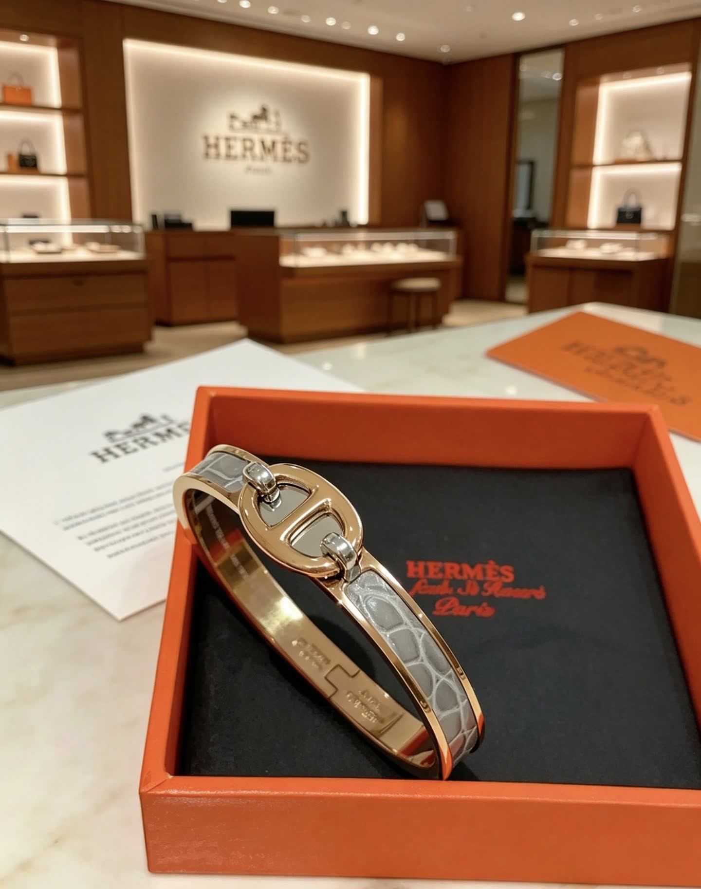 Hermes Hermès Gold and White Leather Bracelet