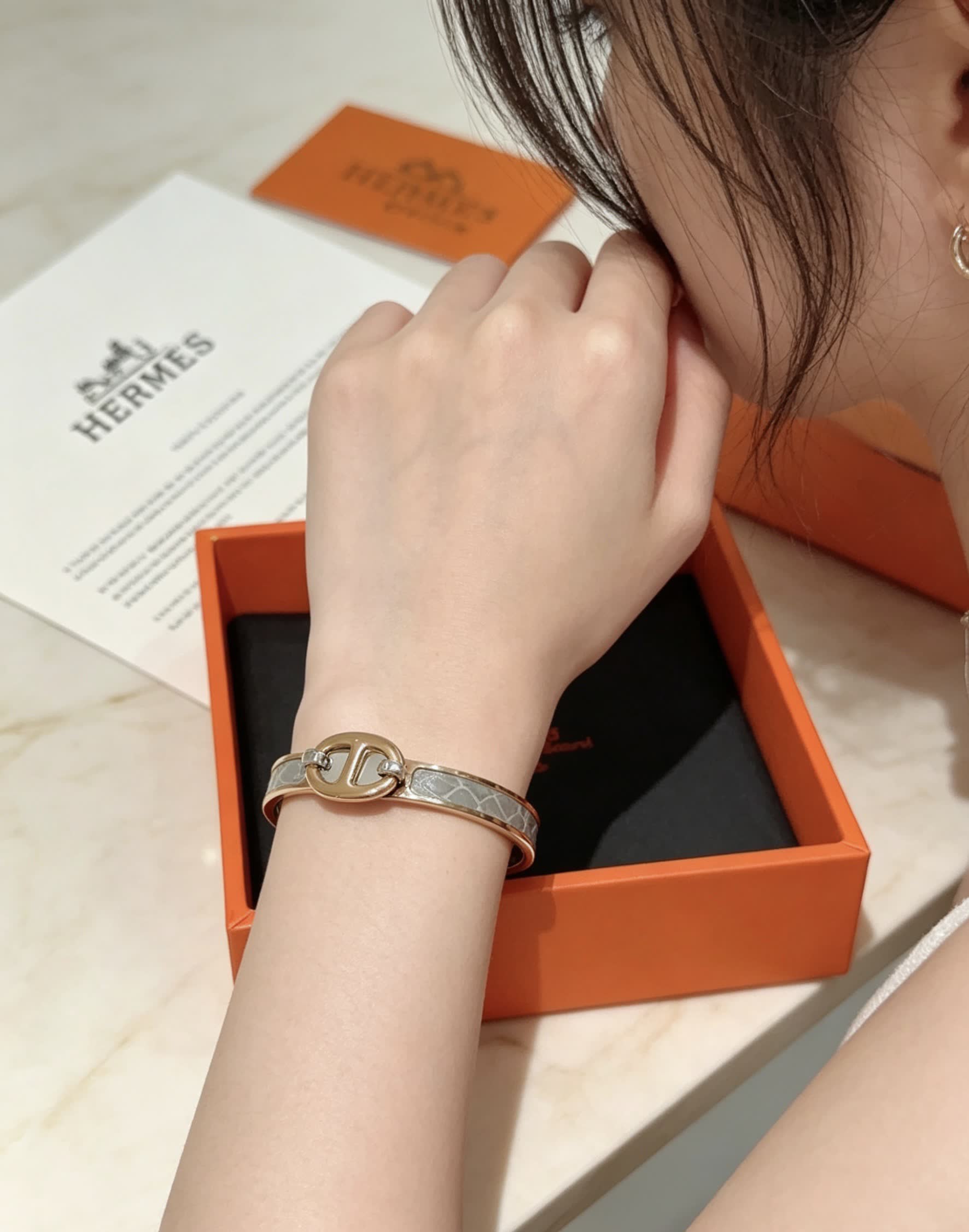 Hermes Hermès Gold and White Leather Bracelet