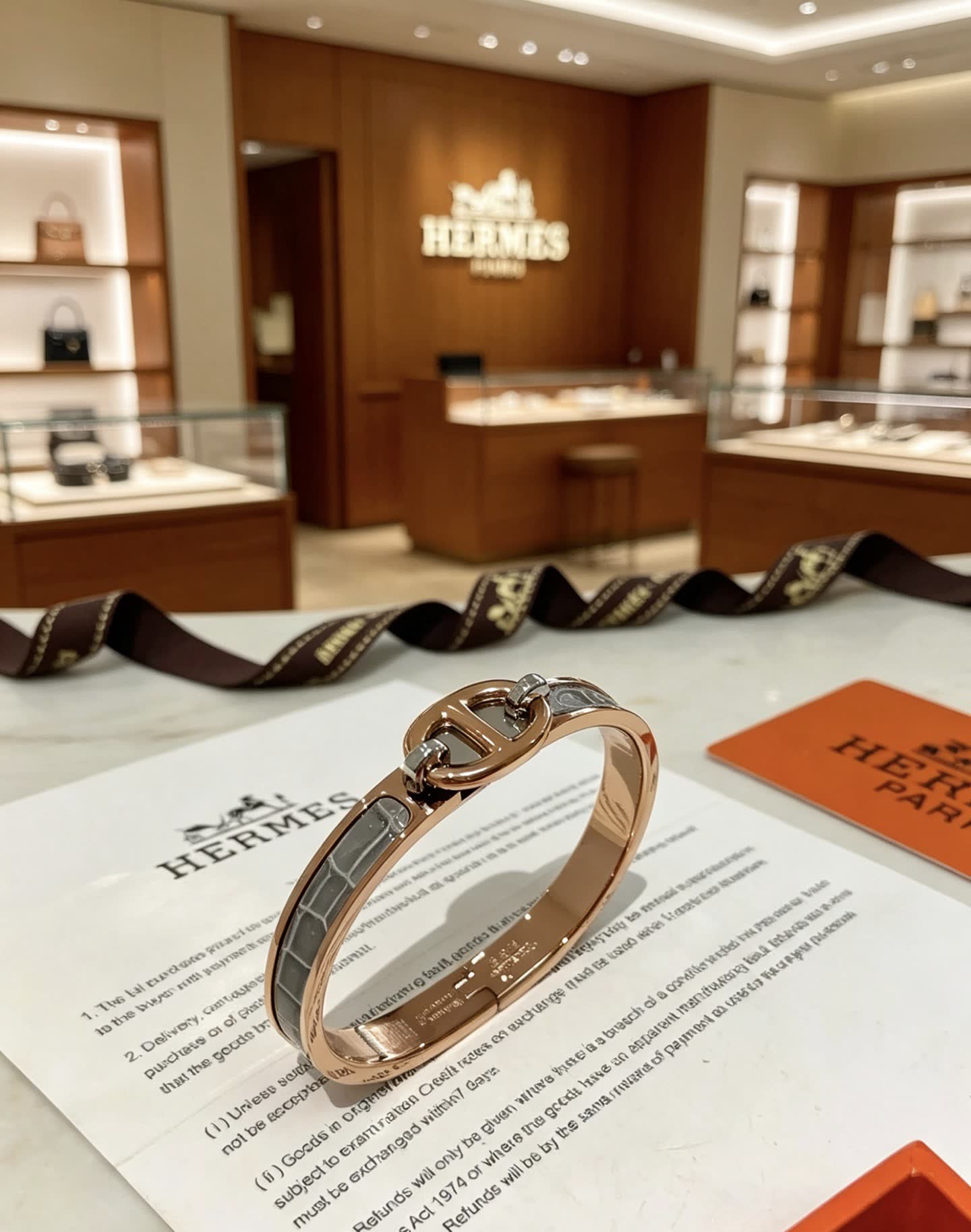 Hermes Hermès Gold and White Leather Bracelet