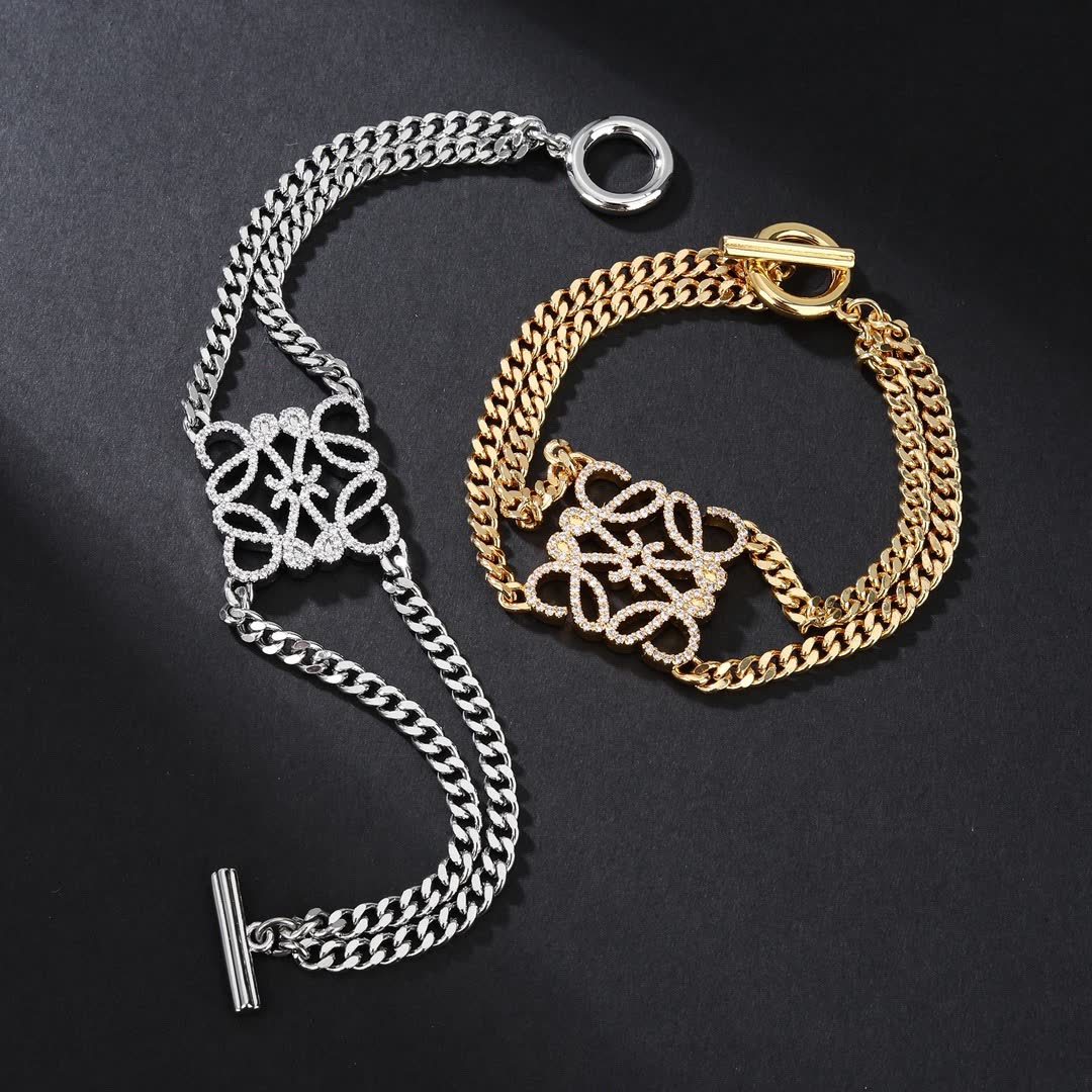 Loewe Elegant Silver and Gold-Tone Diamond Accent Bracelets Loewe Elegant Silver and Gold-Tone Diamond Accent Bracelets