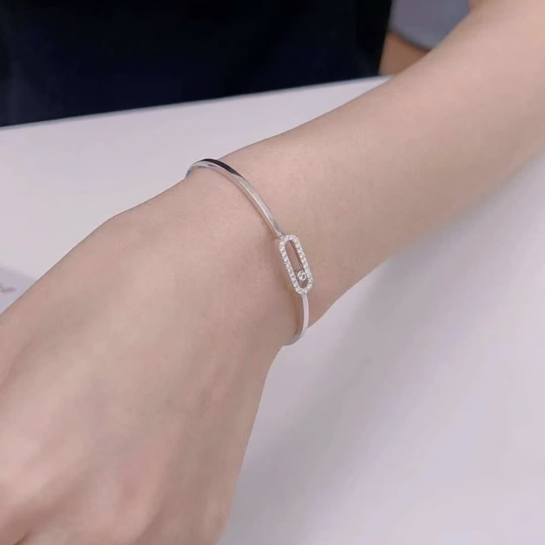 Messika Elegant Silver Bangle Bracelet with Diamond Accents