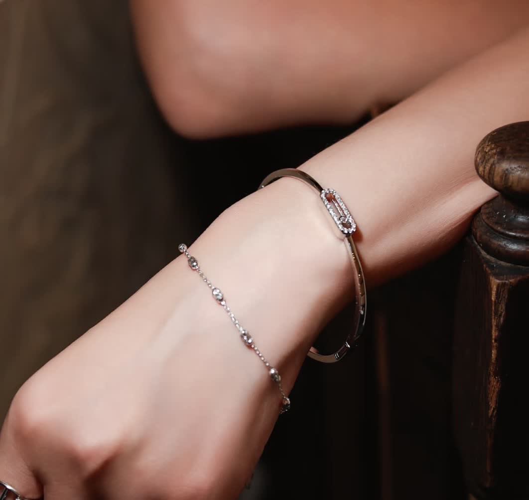 Messika Elegant Silver Bangle Bracelet with Diamond Accents