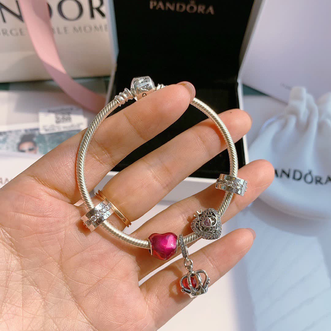 Pandora Sterling Silver Bracelet with Red Enamel and Clear Crystal Charms
