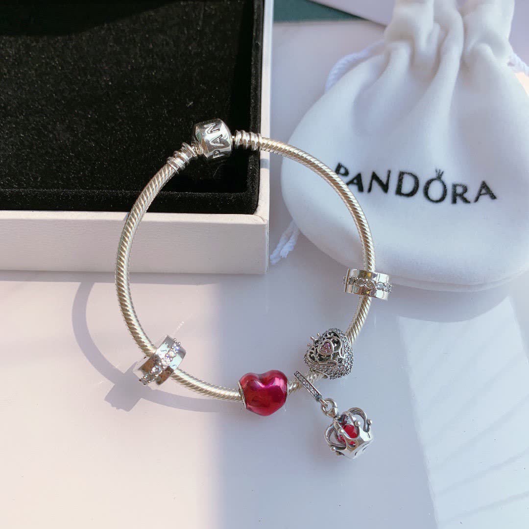 Pandora Sterling Silver Bracelet with Red Enamel and Clear Crystal Charms