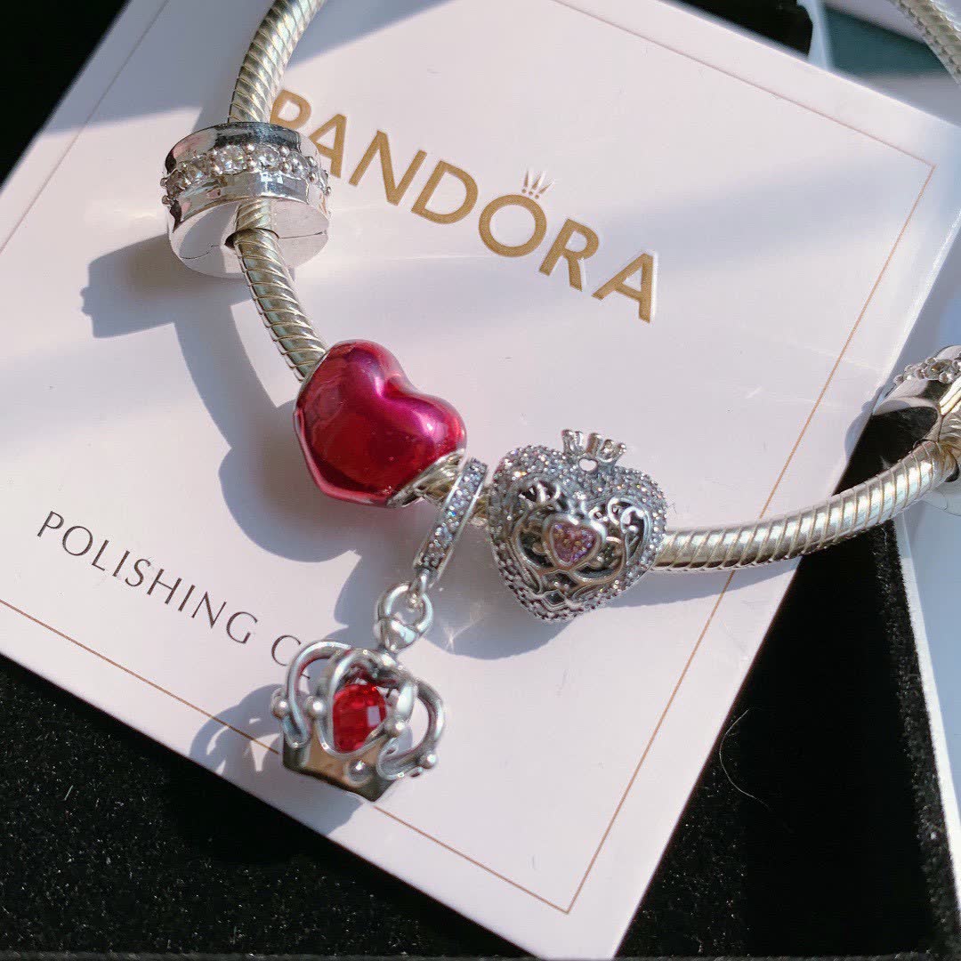 Pandora Sterling Silver Bracelet with Red Enamel and Clear Crystal Charms