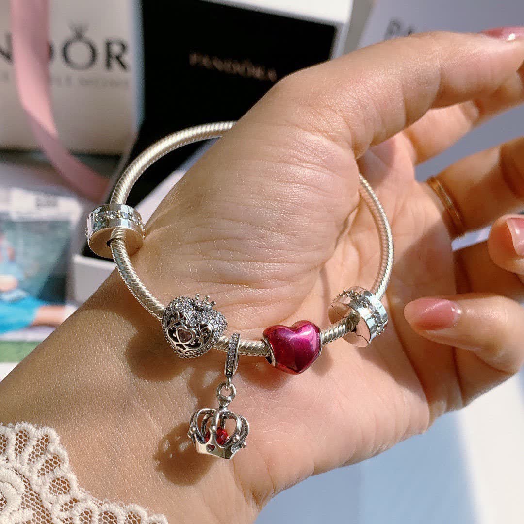 Pandora Sterling Silver Bracelet with Red Enamel and Clear Crystal Charms