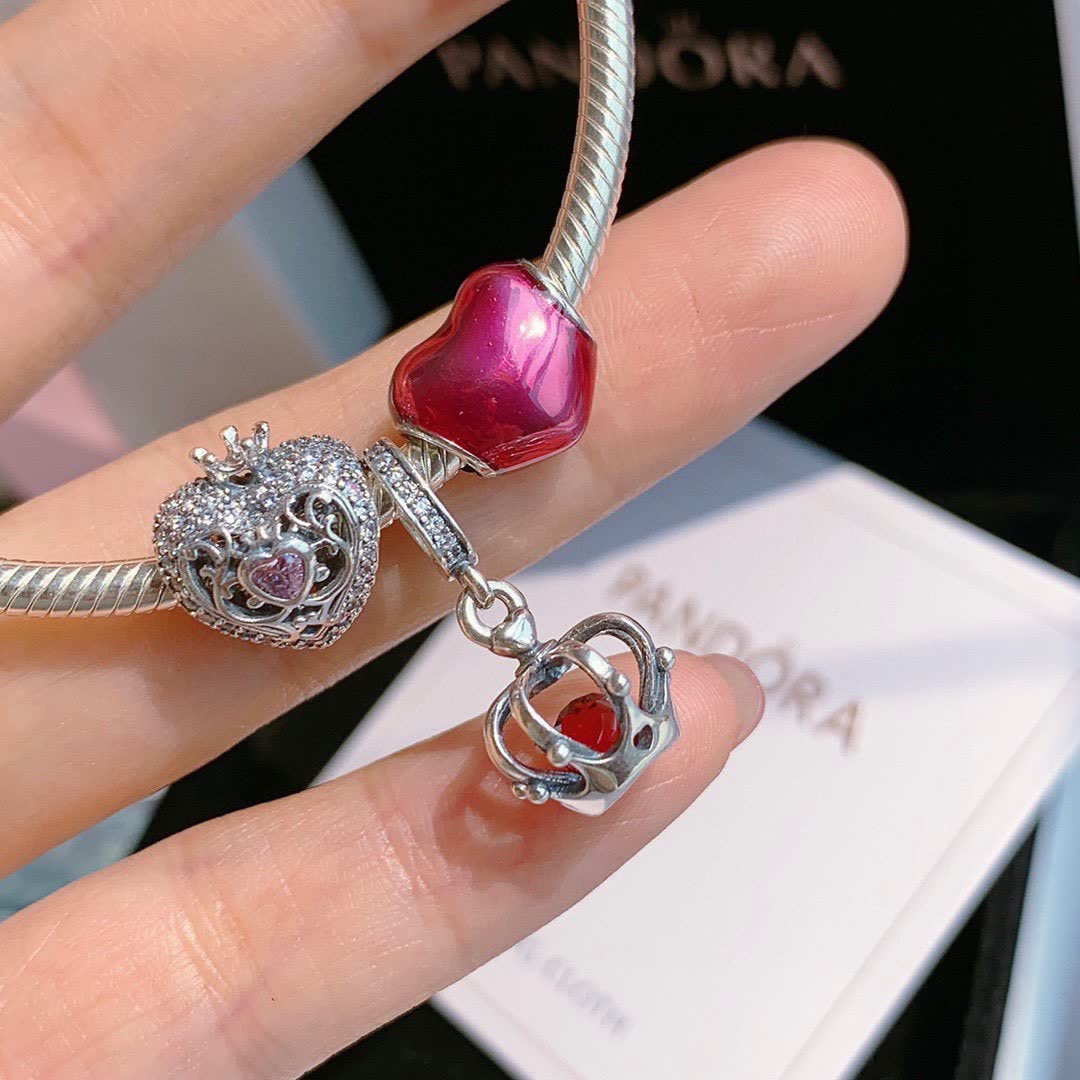 Pandora Sterling Silver Bracelet with Red Enamel and Clear Crystal Charms
