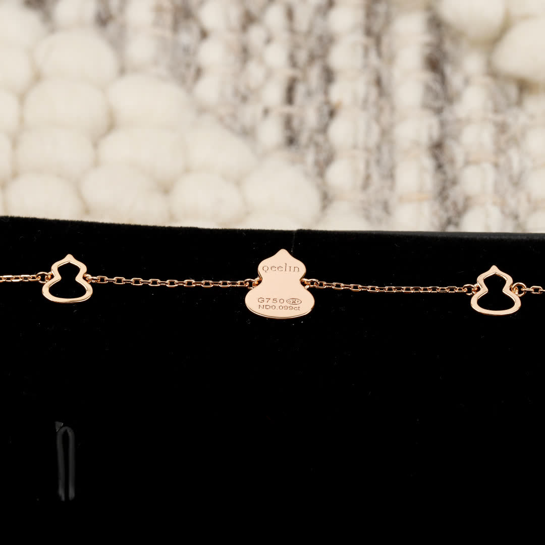 Qeelin Silver Bracelet with Pink Enamel Charm