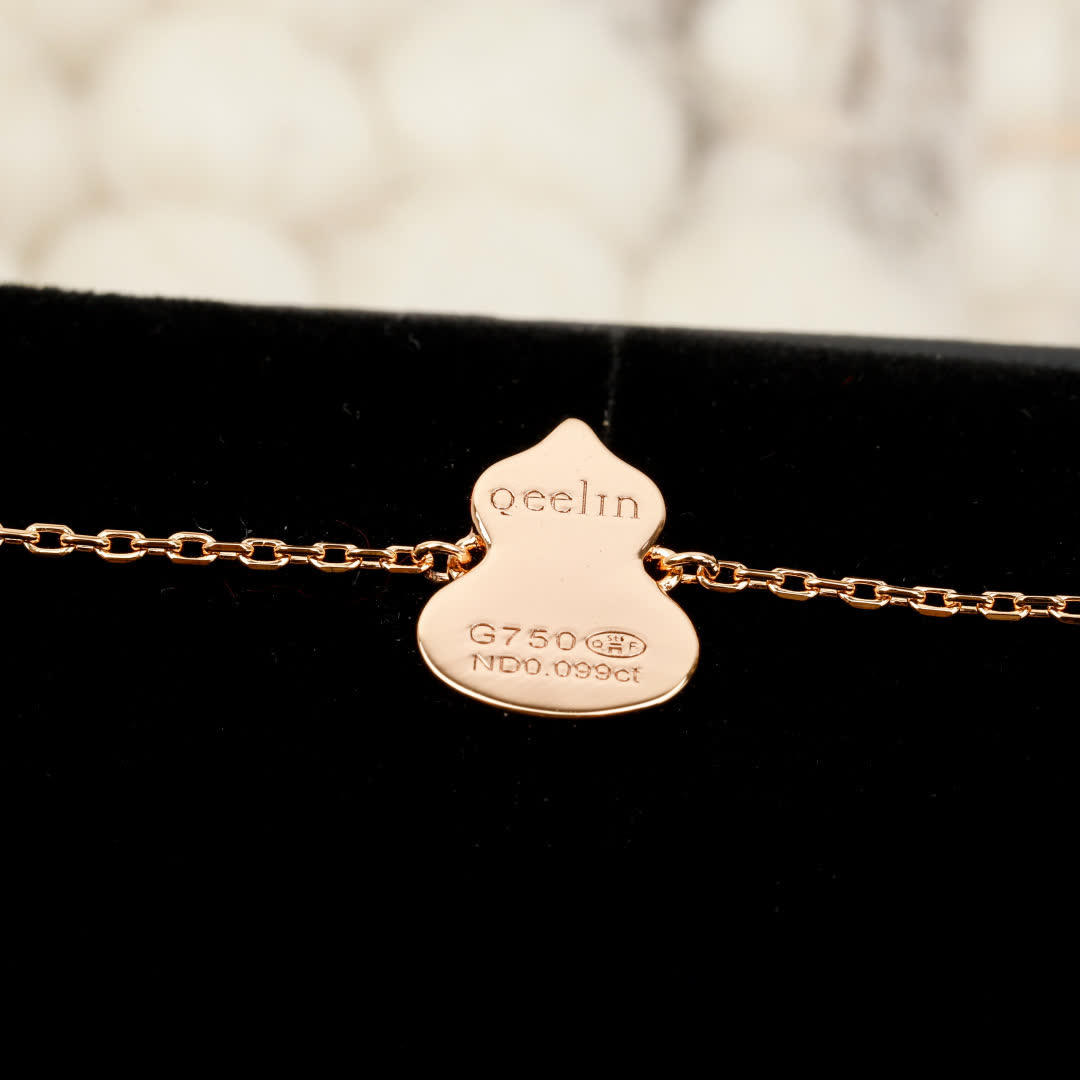 Qeelin Silver Bracelet with Pink Enamel Charm