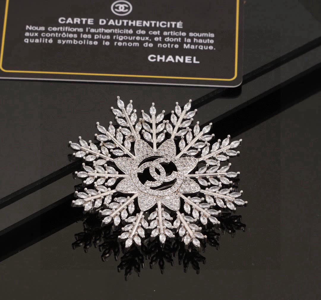 Chanel Snowflake Brooch