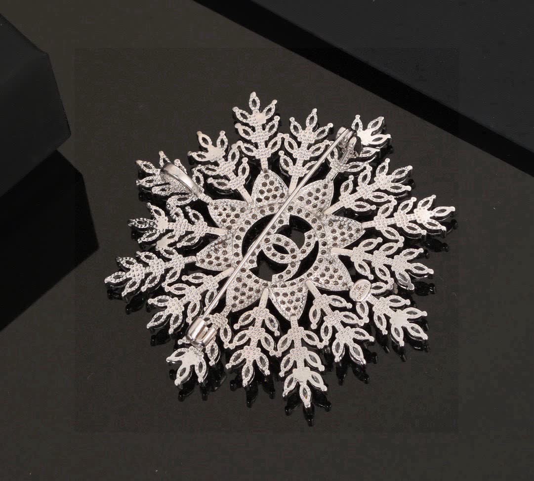 Chanel Snowflake Brooch