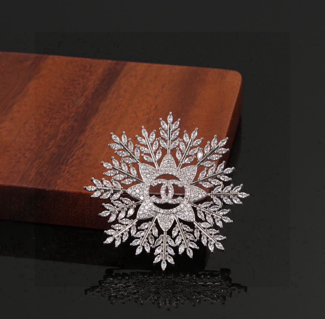 Chanel Snowflake Brooch