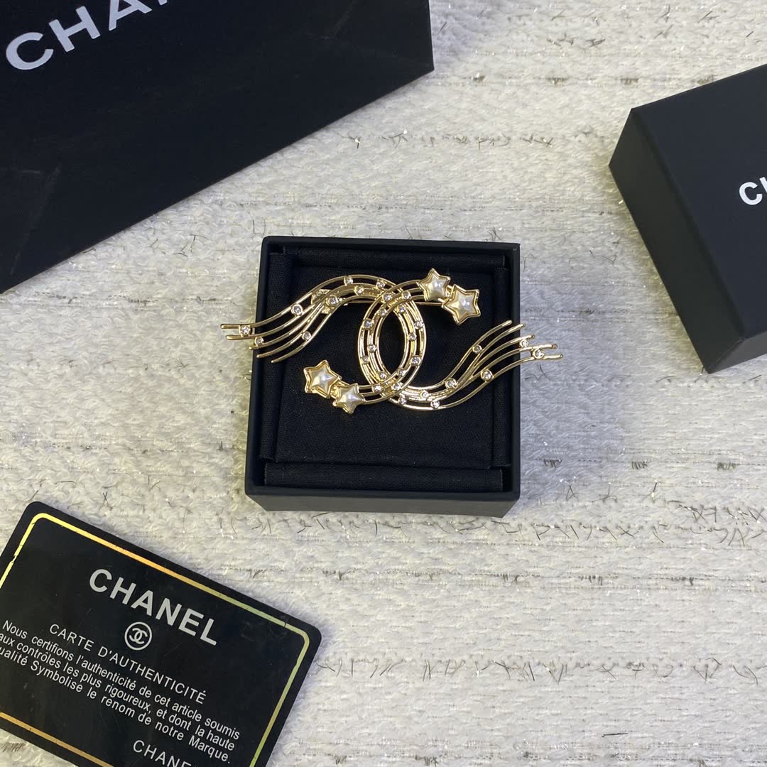 Chanel Gold Tone Wing Brooch with Rhinestones