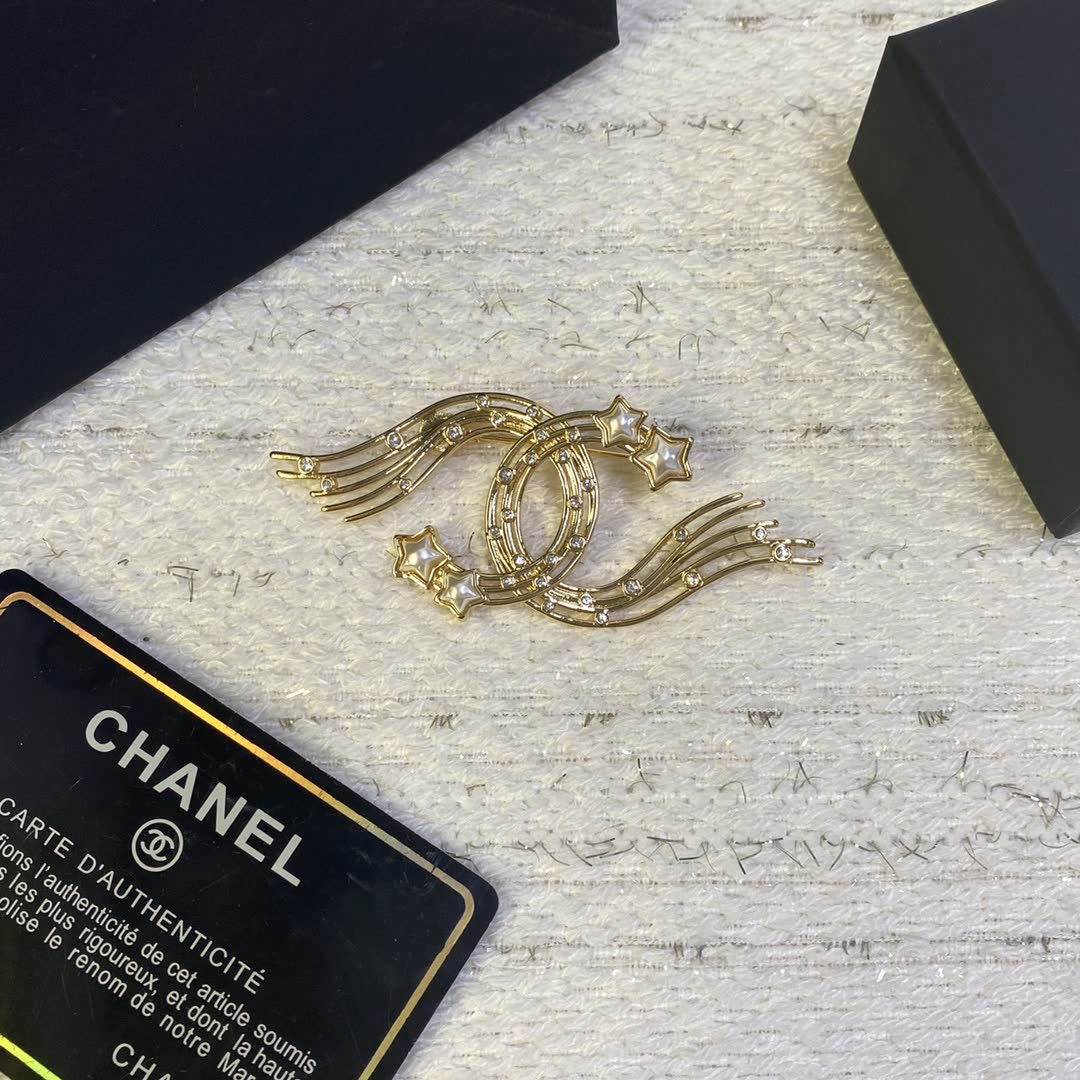 Chanel Gold Tone Wing Brooch with Rhinestones