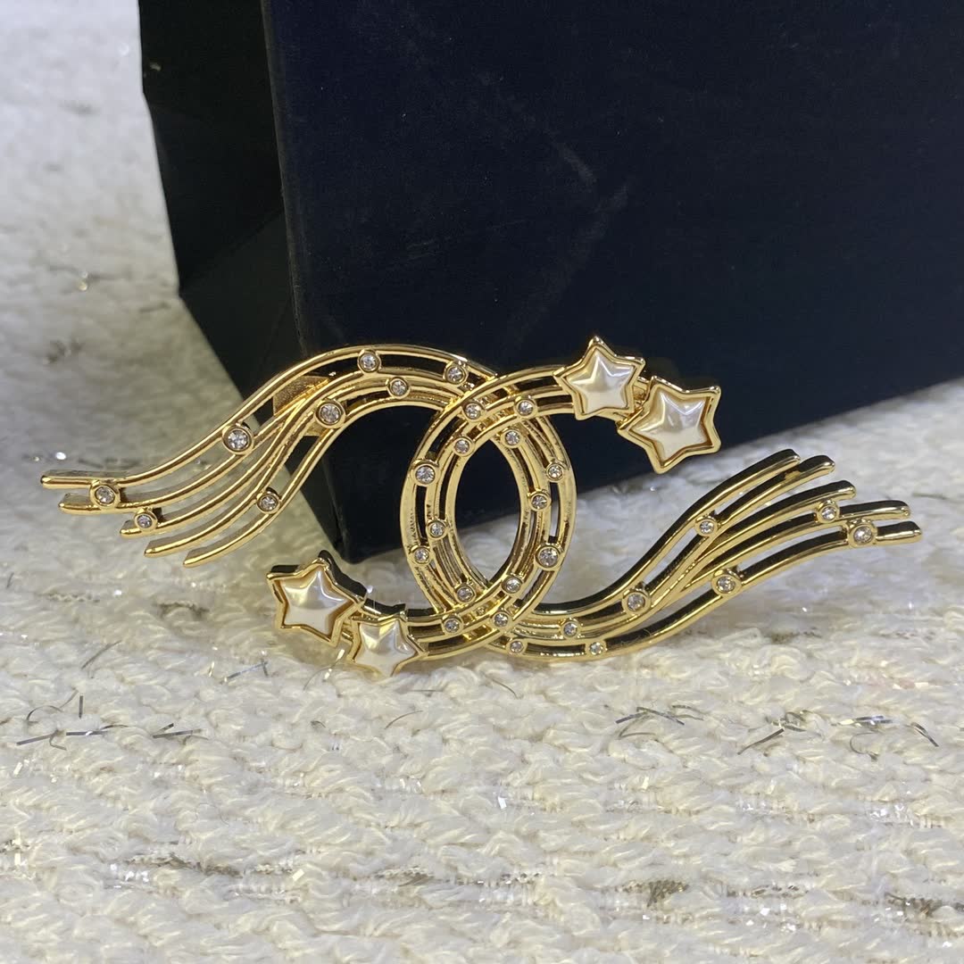 Chanel Gold Tone Wing Brooch with Rhinestones