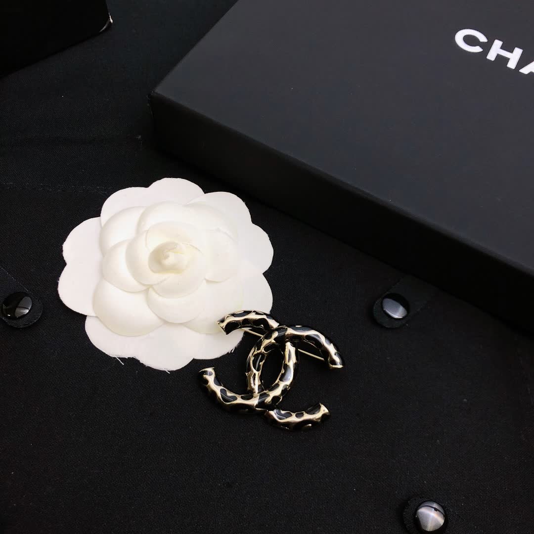 Chanel CC Brooch