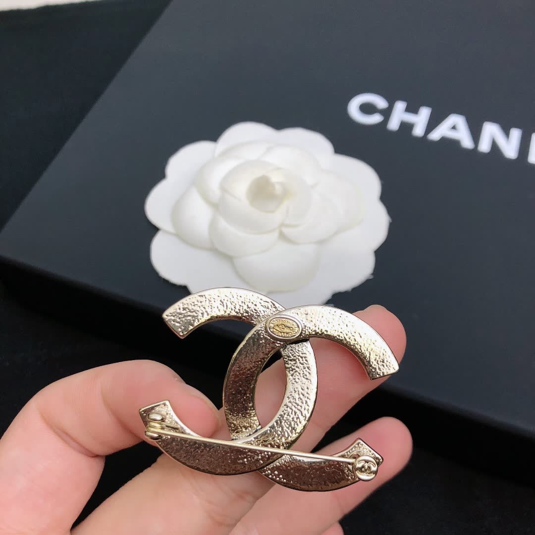Chanel CC Brooch