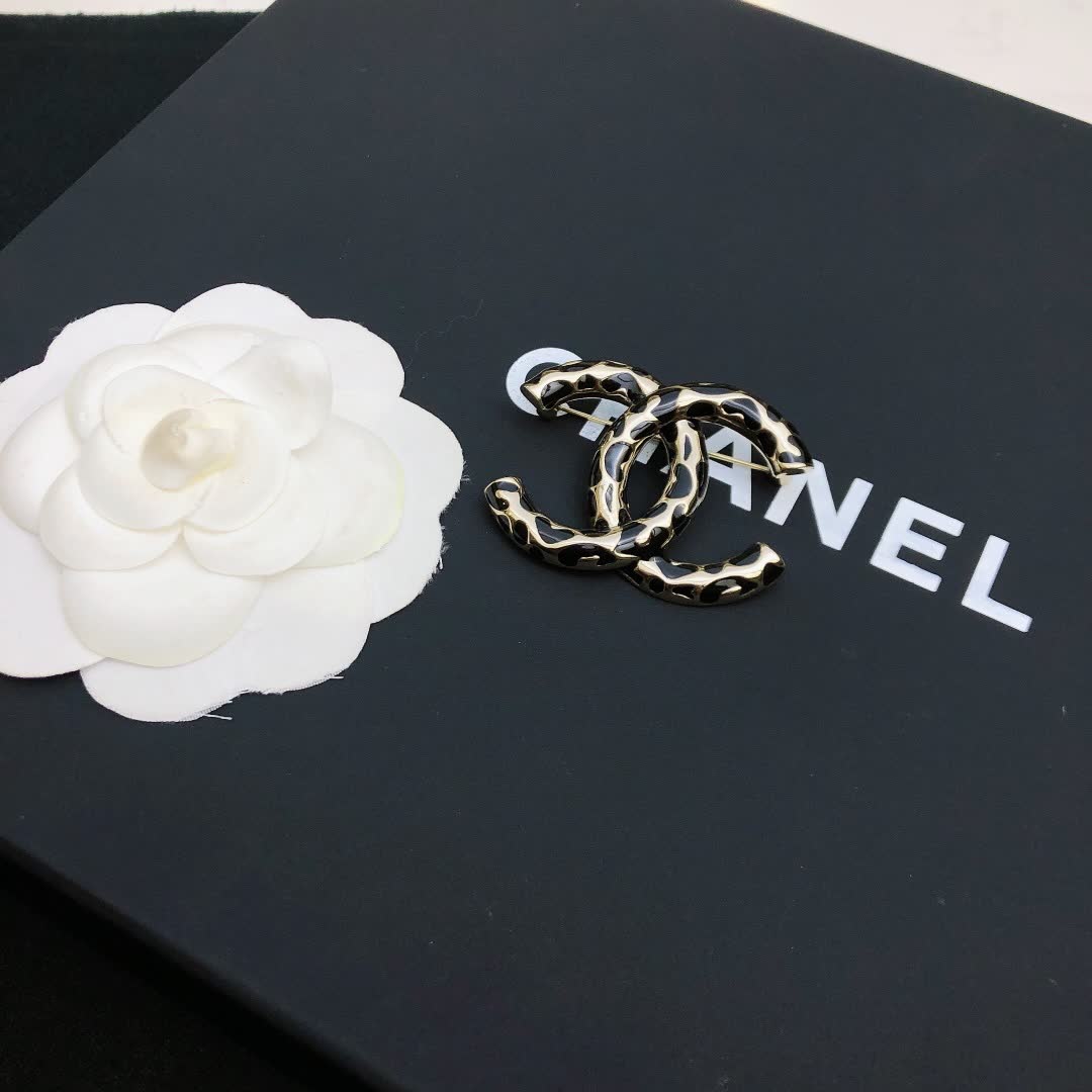 Chanel CC Brooch