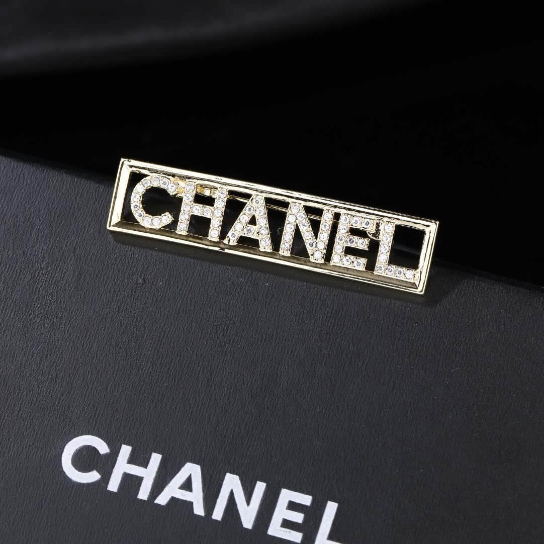 Chanel Crystal Logo Brooch