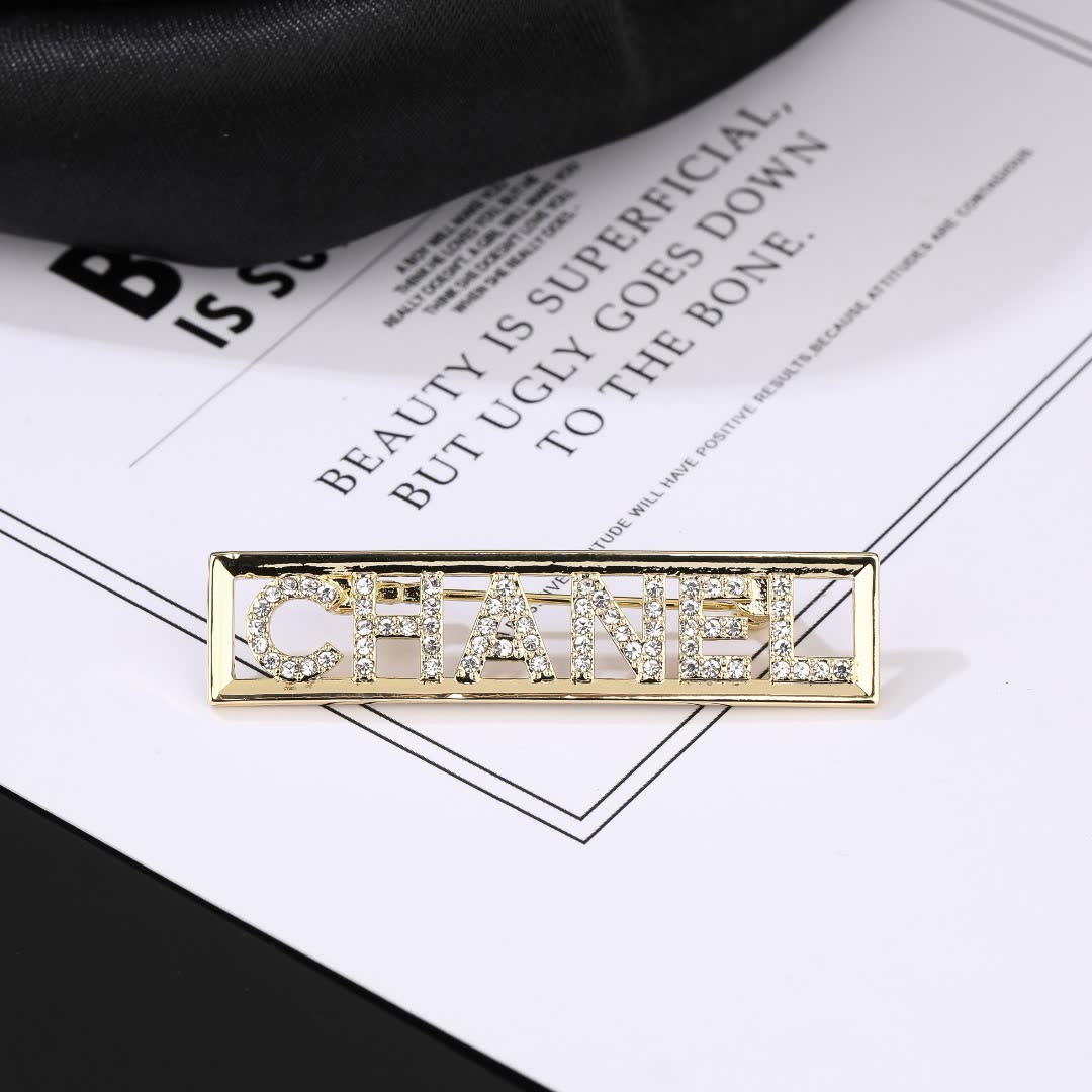 Chanel Crystal Logo Brooch