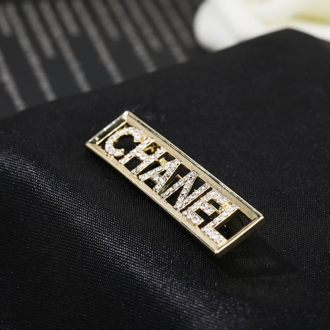 Chanel Crystal Logo Brooch