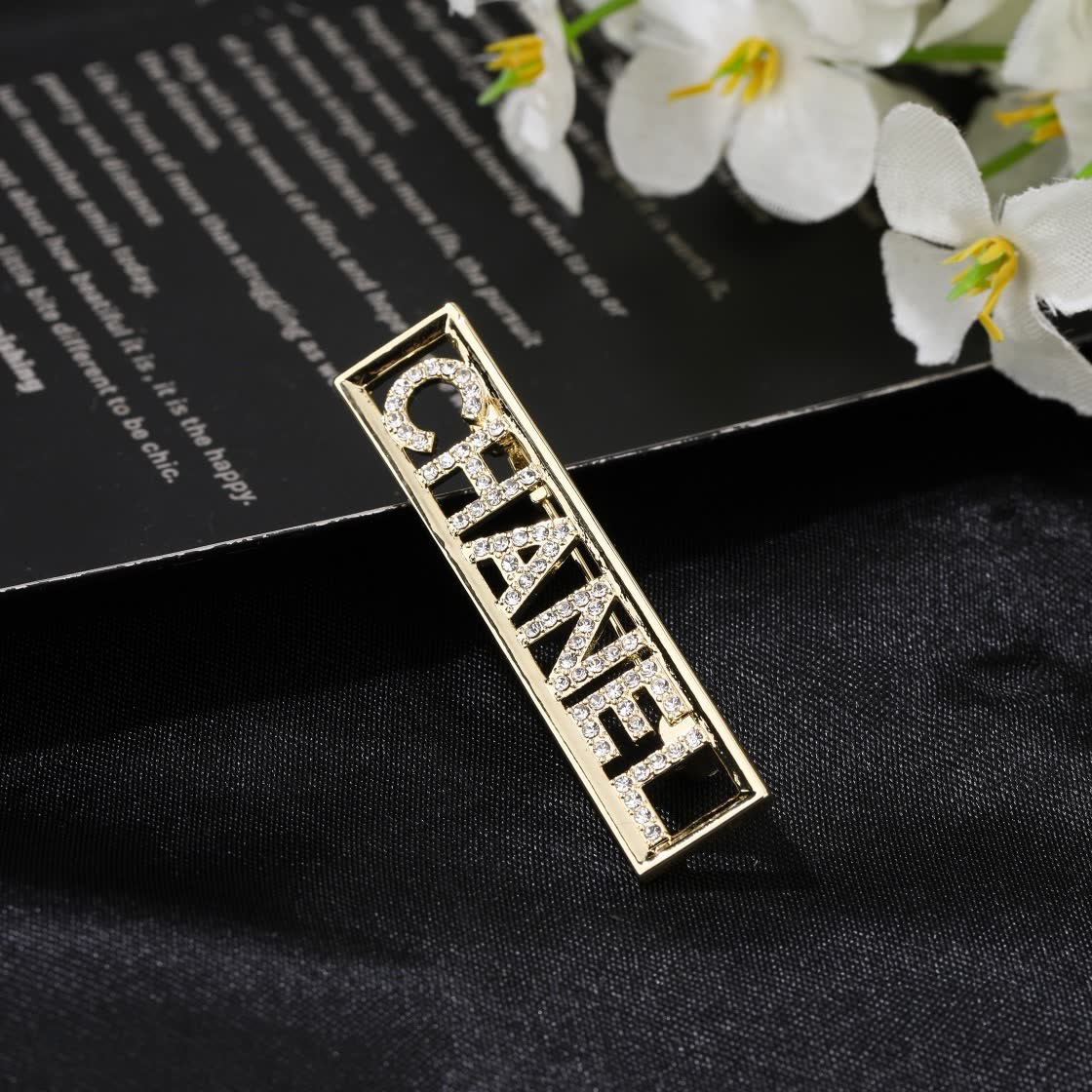 Chanel Crystal Logo Brooch
