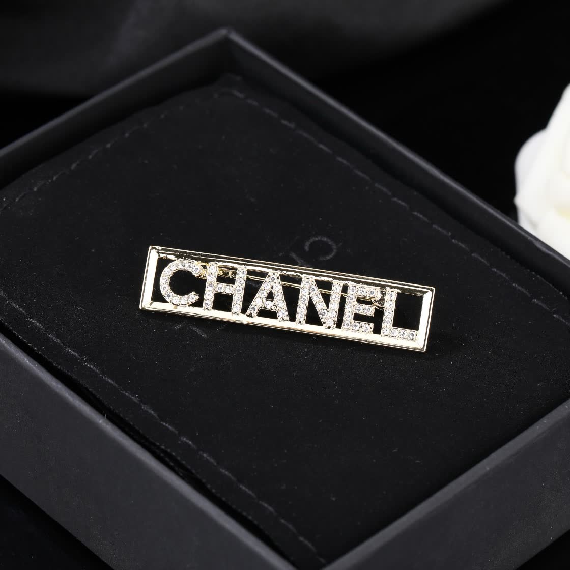 Chanel Crystal Logo Brooch