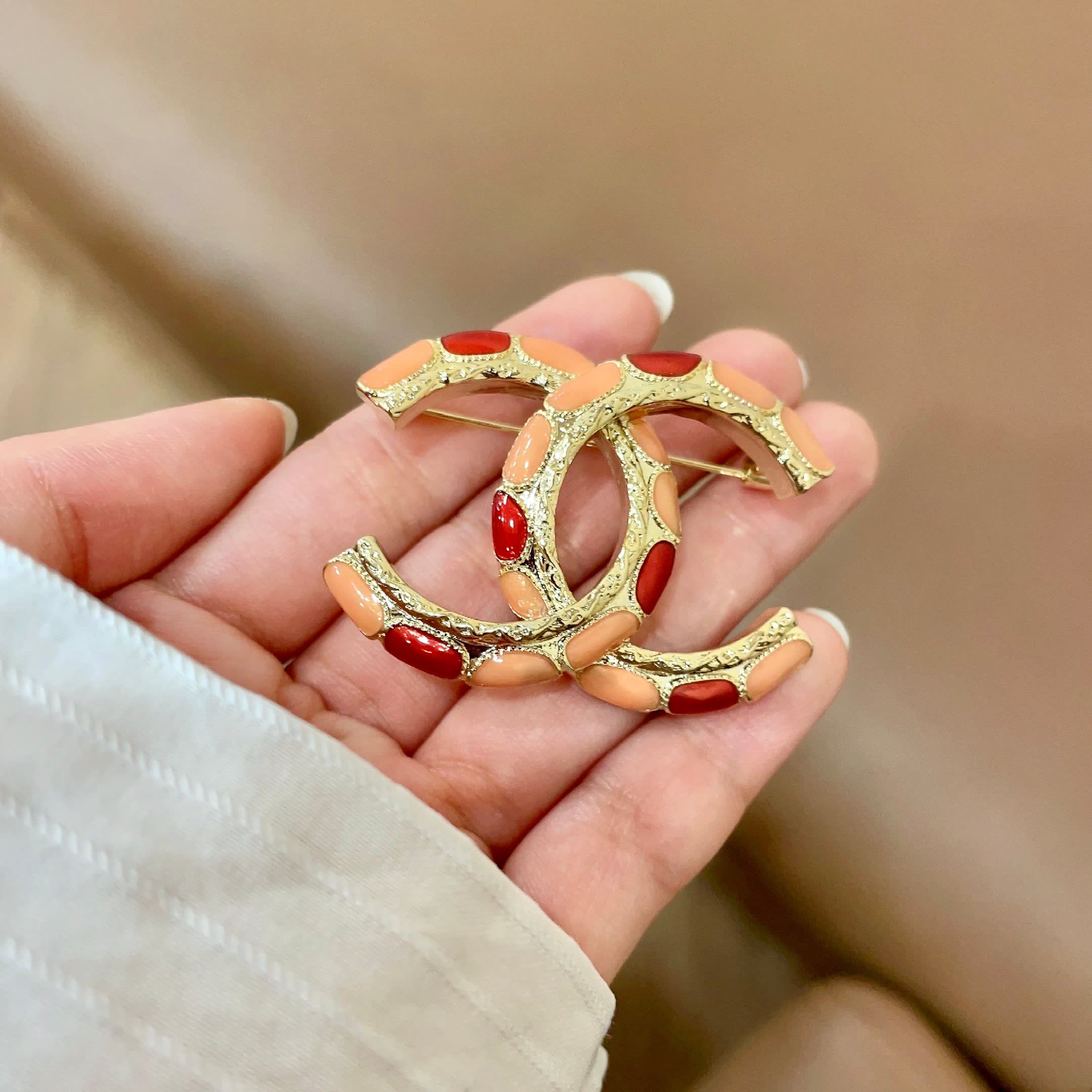 Chanel CC Brooch with Coral Inlay