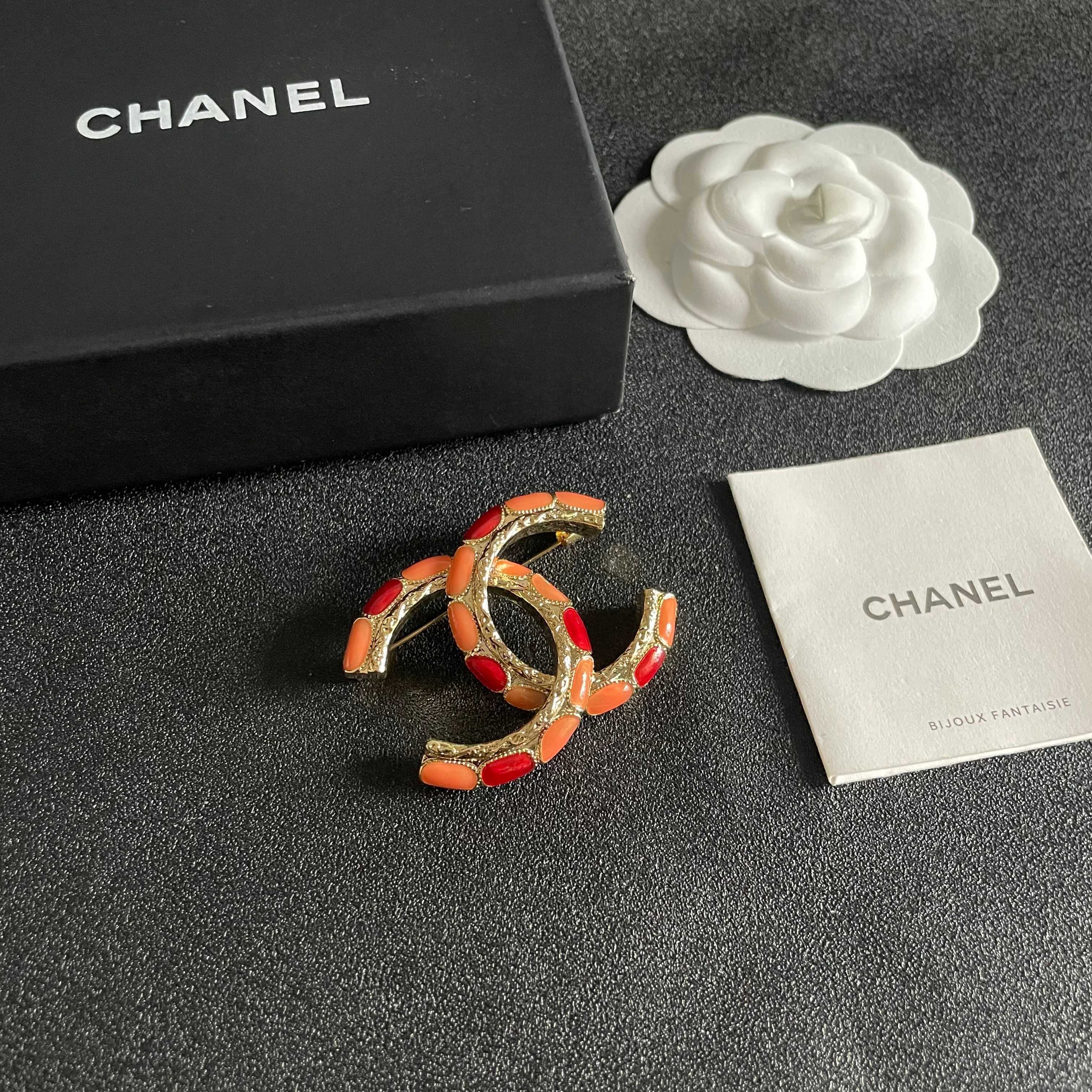 Chanel CC Brooch with Coral Inlay