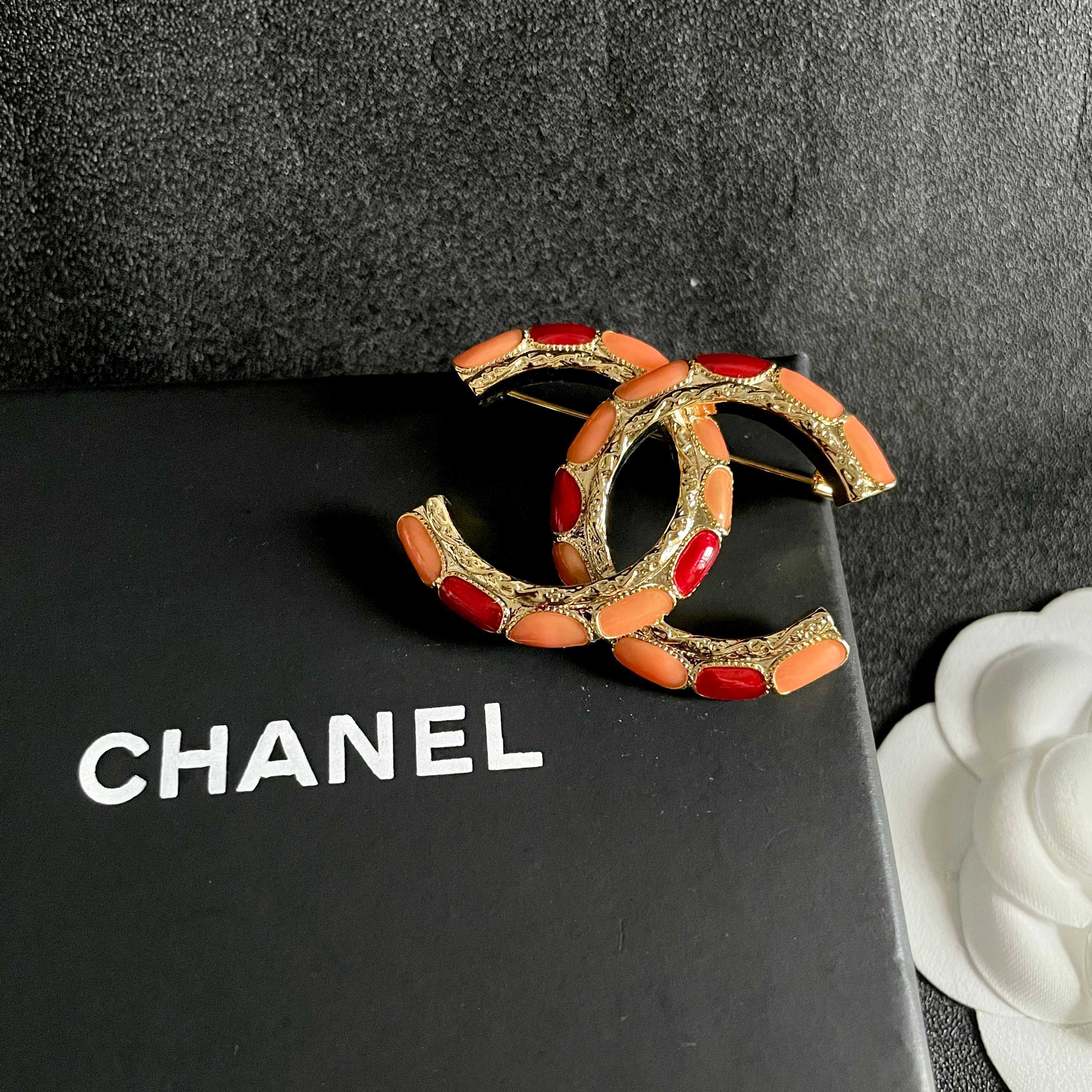 Chanel CC Brooch with Coral Inlay