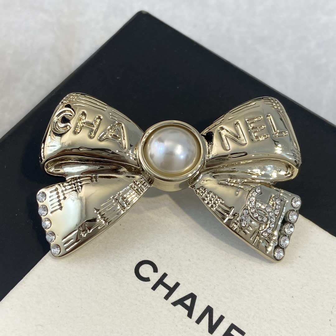 Chanel Gold Tone Pearl Bow Brooch Chanel Gold Tone Pearl Bow Brooch