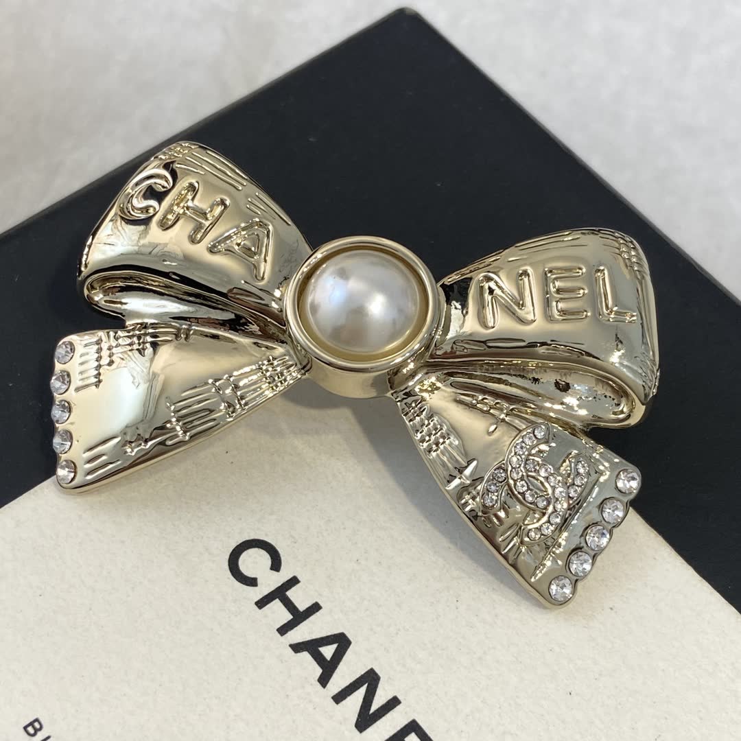 Chanel Gold Tone Pearl Bow Brooch