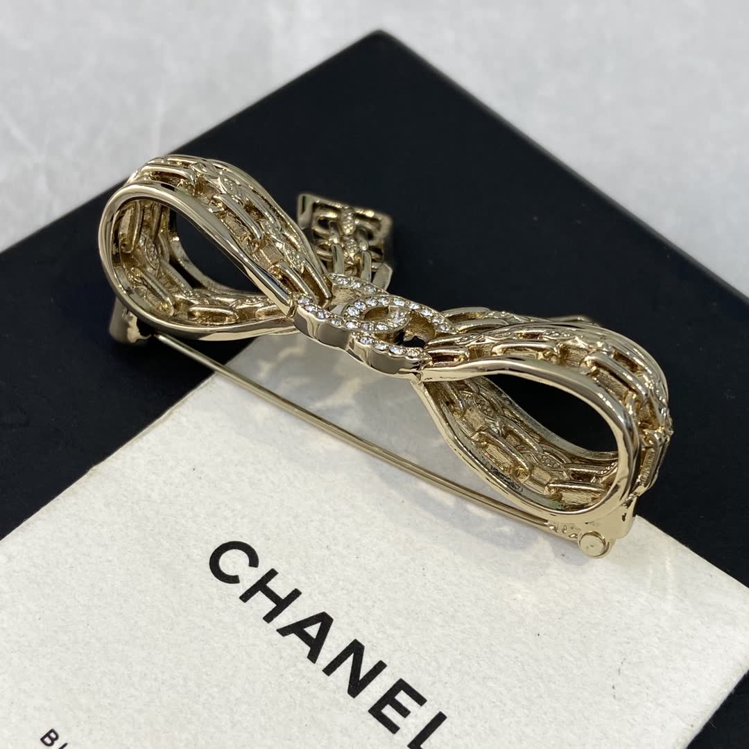 Chanel Gold Tone Rhinestone Bow Brooch