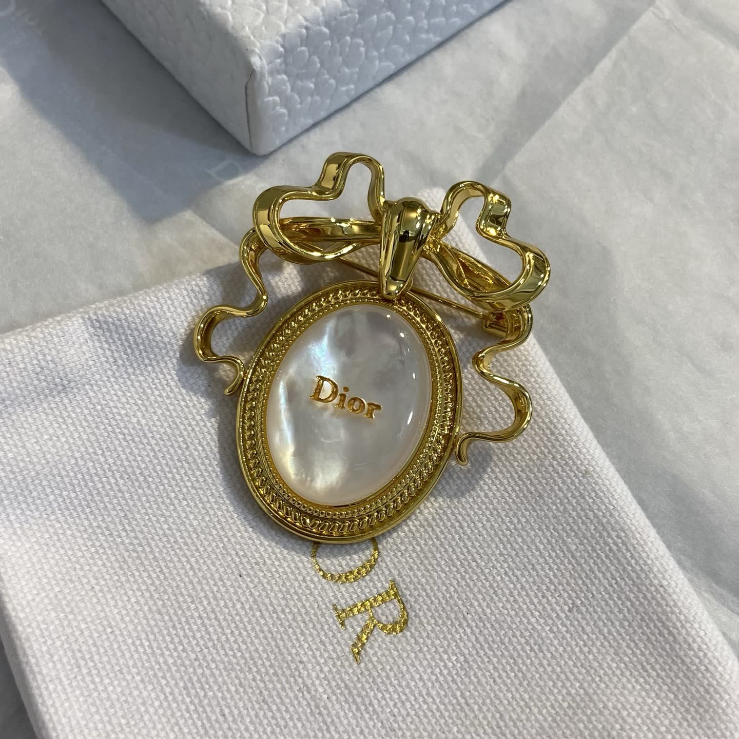 Dior Gold Tone Brooch with Pearl and Bow Design