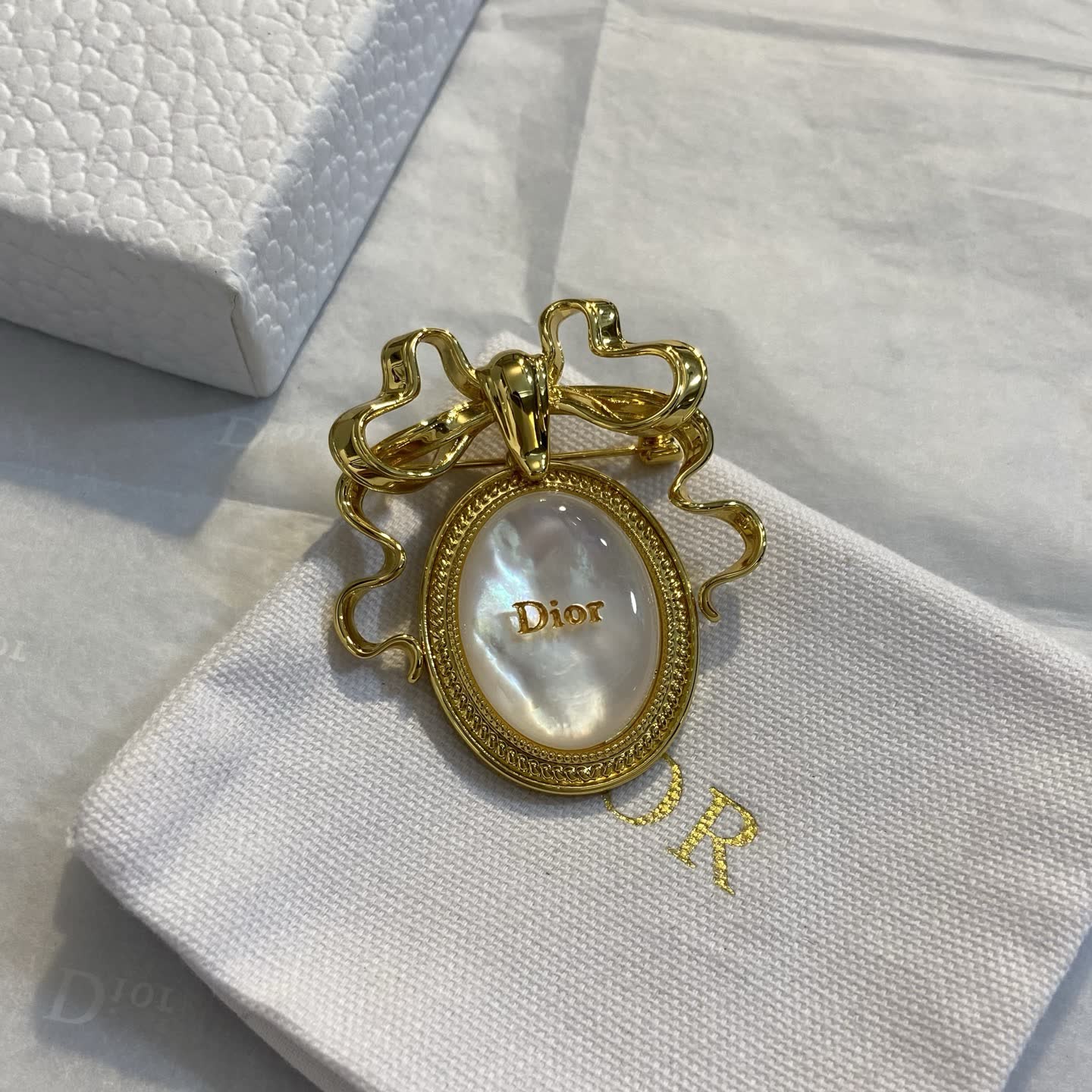 Dior Gold Tone Brooch with Pearl and Bow Design