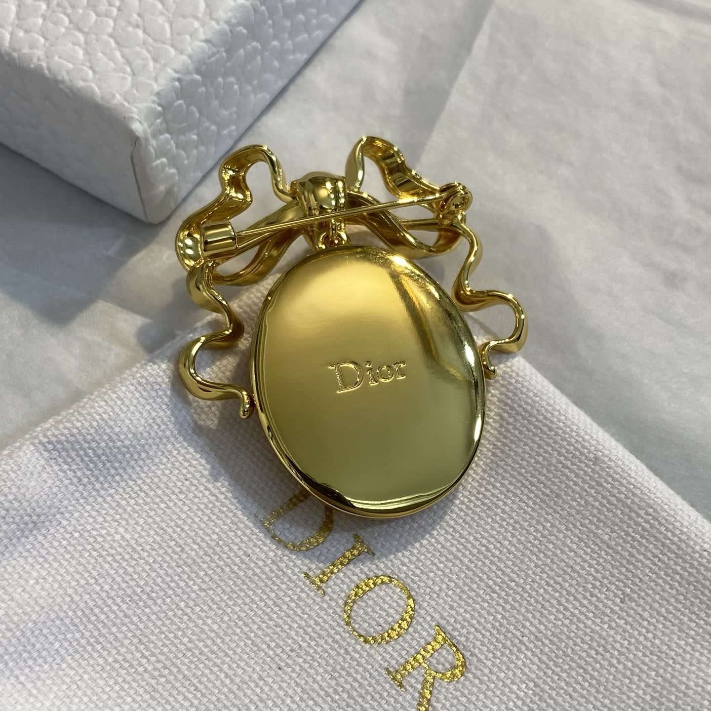 Dior Gold Tone Brooch with Pearl and Bow Design