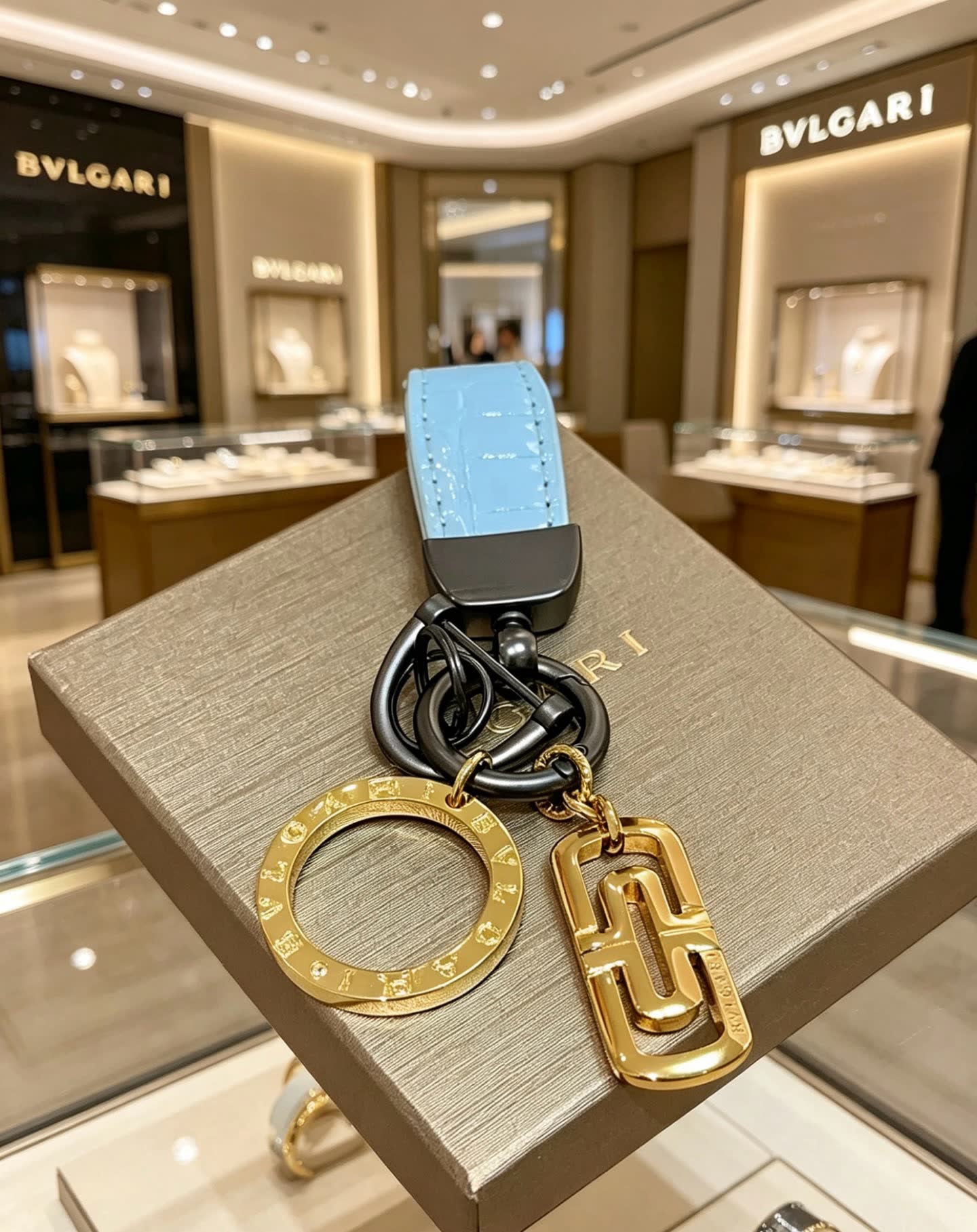 Bvlgari Blue Leather Keychain with Gold Charms