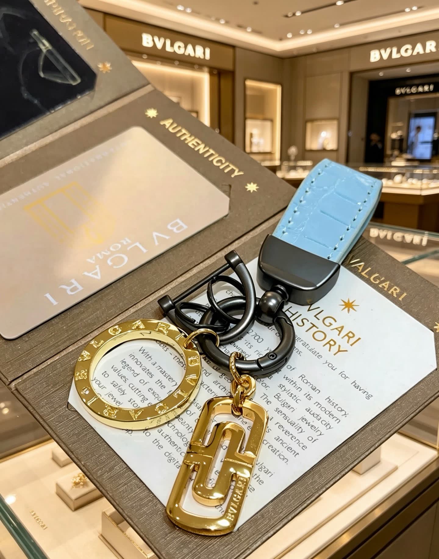 Bvlgari Blue Leather Keychain with Gold Charms