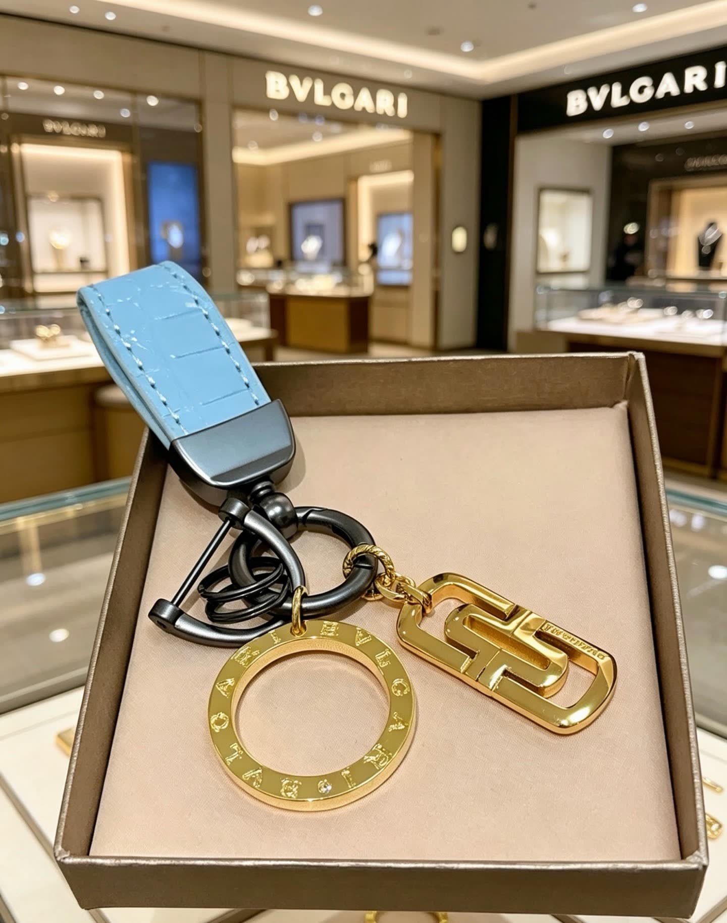 Bvlgari Blue Leather Keychain with Gold Charms